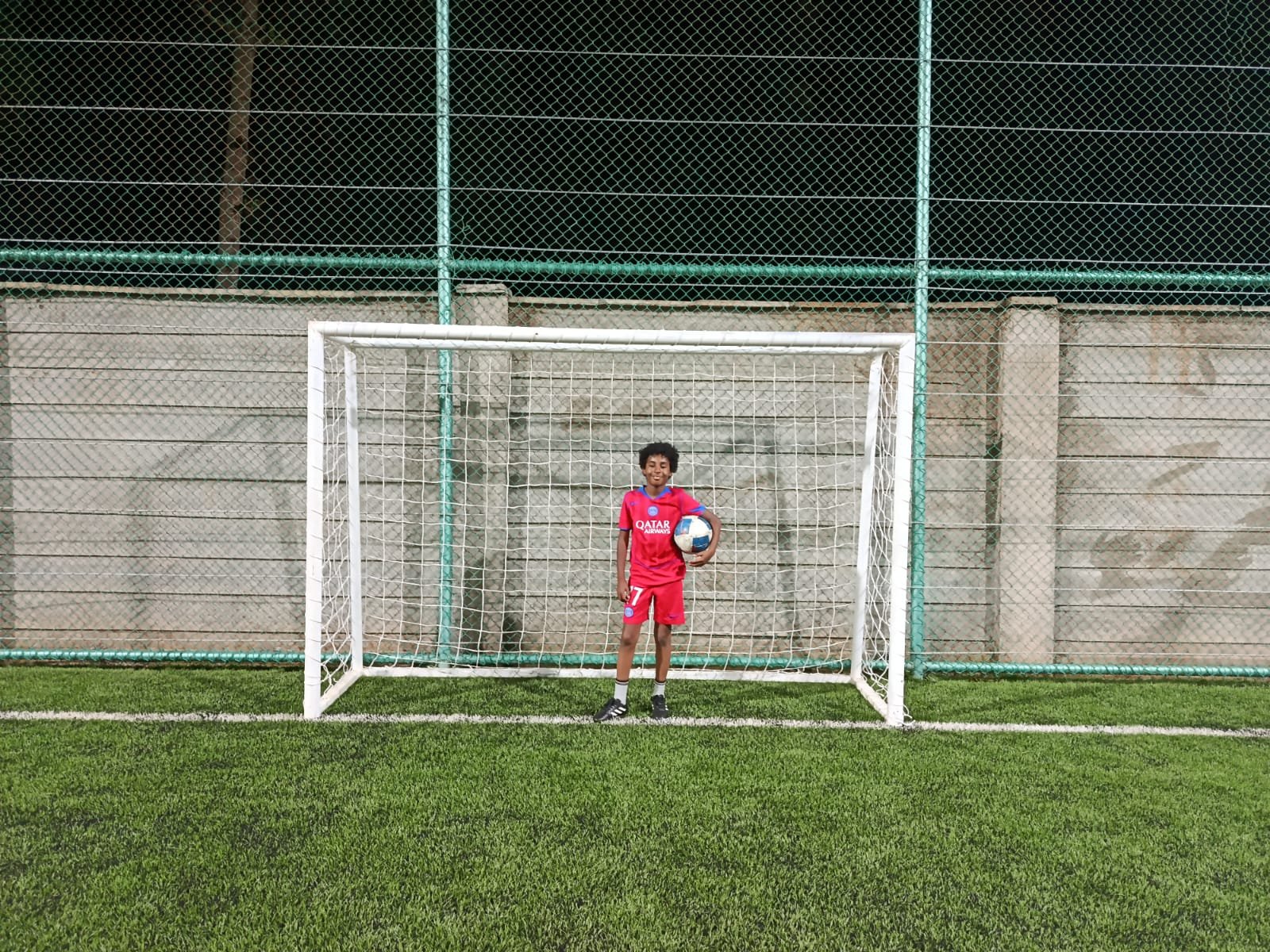 The first day in goal. The pitch feels enormous and the gloves feel new.